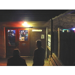 Bobby and Rob out on the porch enjoying smoke in the twilight. 